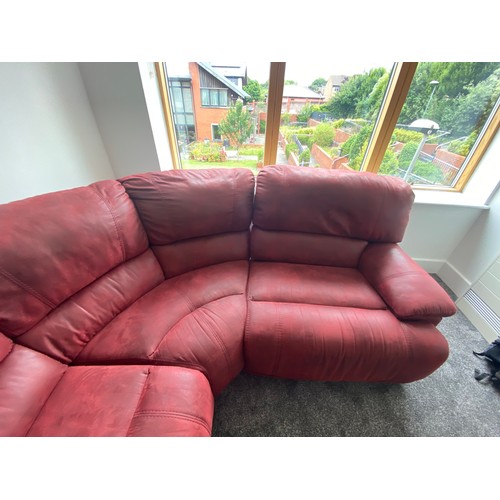 49 - Large red suede leather corner settee with recliners; 310cm long.