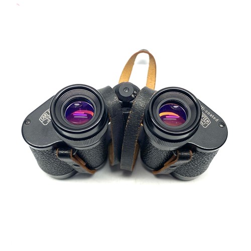 674 - Carl Zeiss Jena multi coated jenaopten 8 x 30 wide binoculars in leather case.