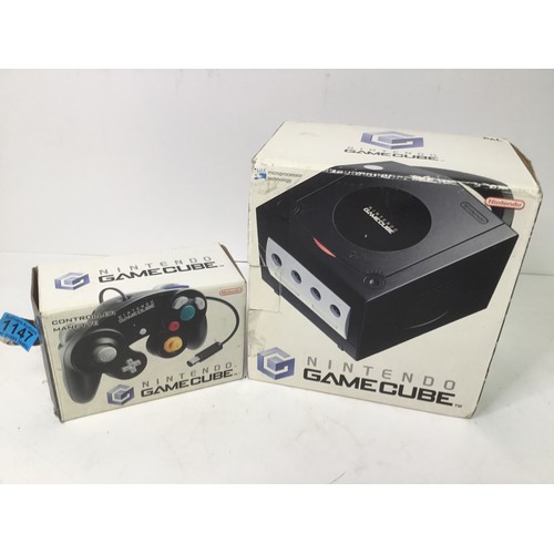 1147 - Nintendo GameCube console with controller and memory cards