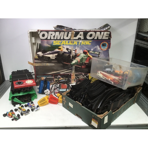 1149 - Formula one Scalextric with lots of track, controllers and cars