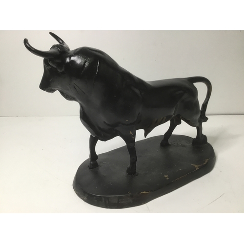 627 - Large heavy brass or Possibly Bronze Bull on a stand 28cm x 33cm (very heavy)