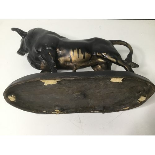 627 - Large heavy brass or Possibly Bronze Bull on a stand 28cm x 33cm (very heavy)