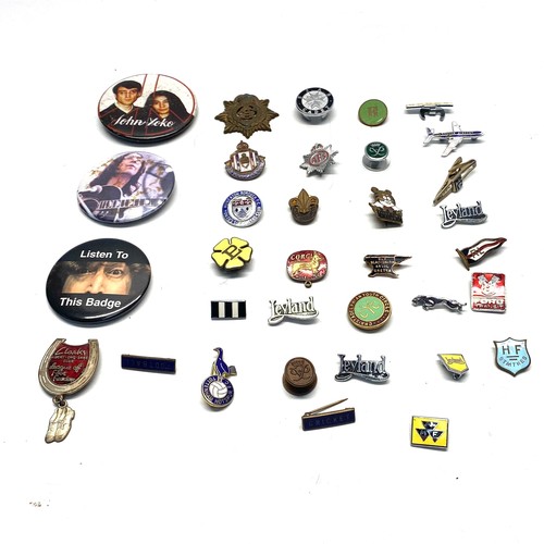 616 - Collection of badges including: Clarks and Ford automobiles.