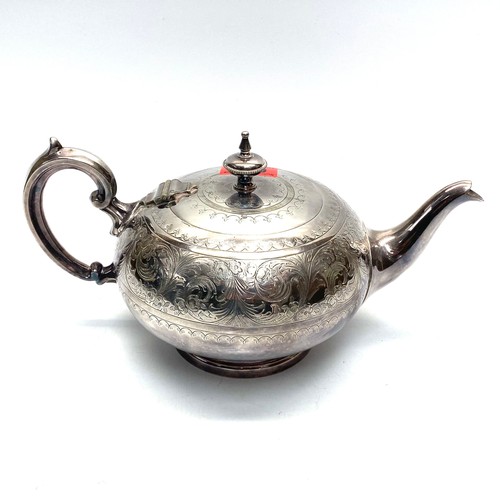 640 - Beautifully engraved silver plate teapot with makers mark to base.