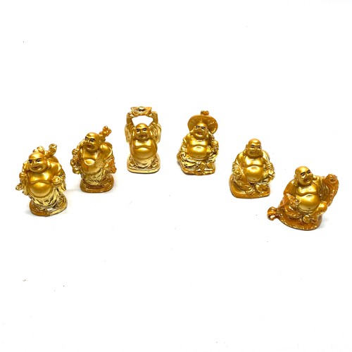 654 - 6 golden painted laughing Buddhas.