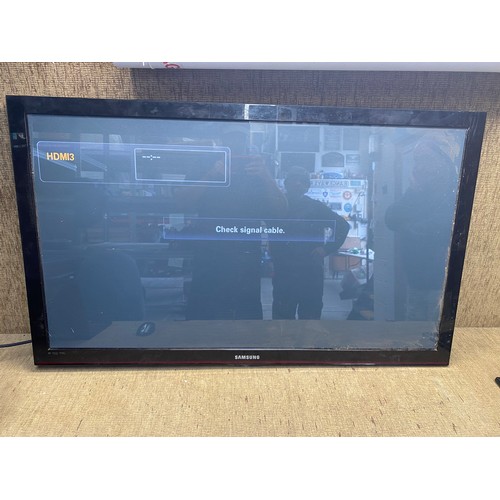 53 - samsung tv 50 inch with stand (no remote).