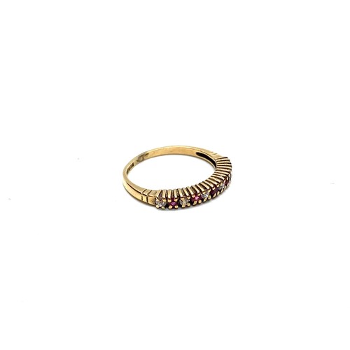 859 - 9ct gold ring with diamonds and rubies, size K and 1.4g.