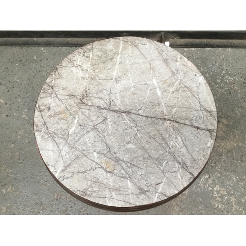 684 - French style marble topped table with brass castors