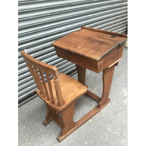 686 - Oak mid century school desk with attached char