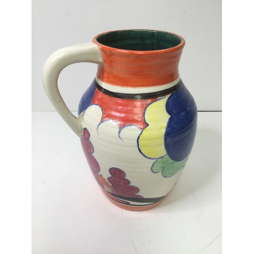 885 - Clarice Cliff style blue autumn handled jug 29cm slight exterior damage, crack to handle and glazing... 