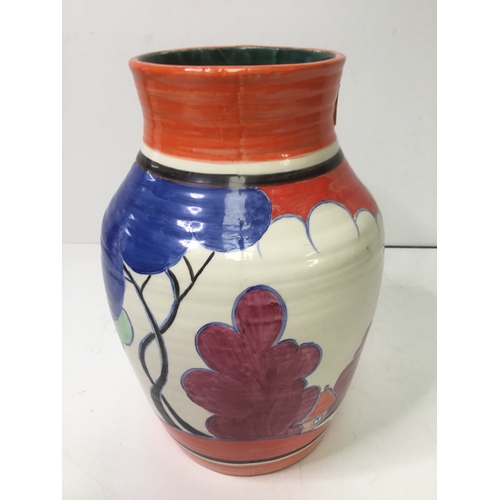 885 - Clarice Cliff style blue autumn handled jug 29cm slight exterior damage, crack to handle and glazing... 