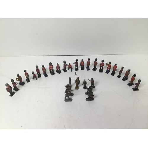 888 - Approximately 30 toy lead soldiers including palace guards