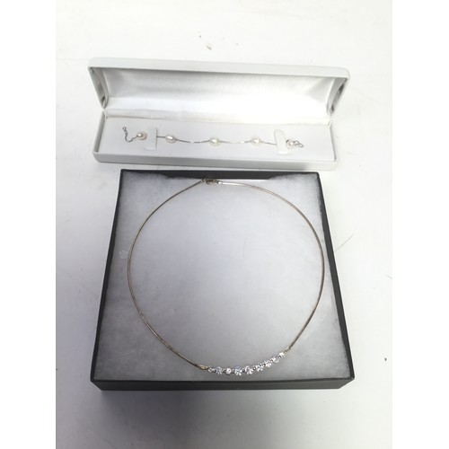 898 - Sterling silver necklace and a silver bracelet with pearls