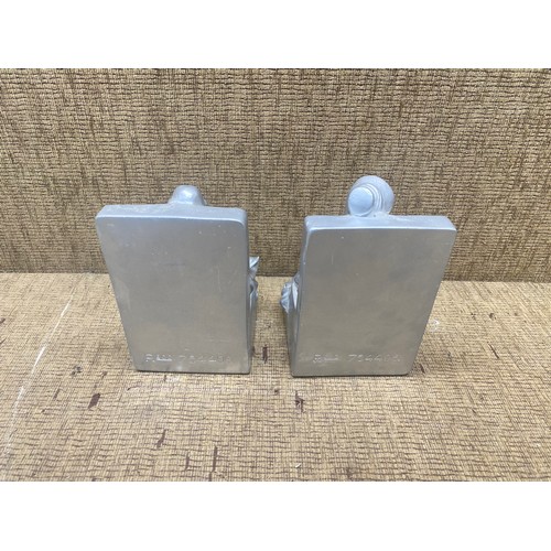 494 - pair of silver painted bookends.