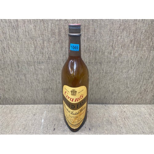 1069 - large grant's blended scotch whiskey bottle 52cm tall.