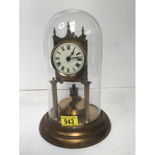 943 - glass domed clock torsion clock working when booked in