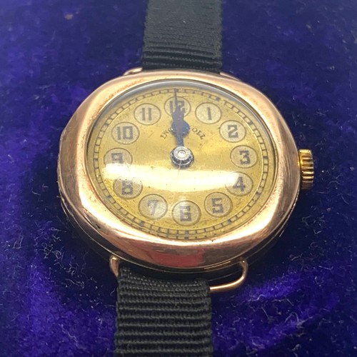 951 - 9ct gold ladies' watch with original box and strap by Ingersoll (not running).