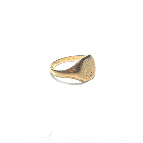 952 - 9ct gold signet ring 3.2g and size R.