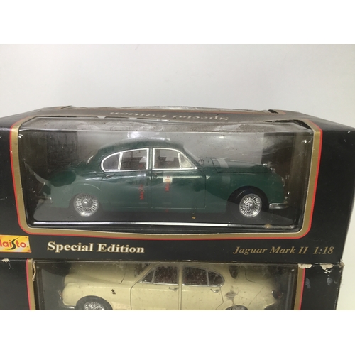 356 - Three boxed model cars by Burago and Maisto Jaguar SS 100 and Mk2