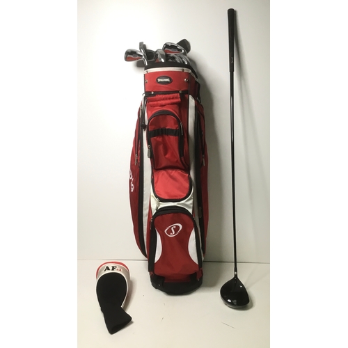 50 - Spalding SP99 golf bag with a selection of clubs