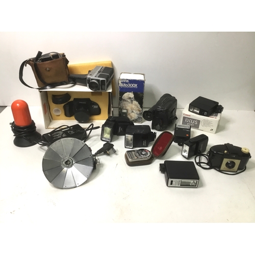 61 - A selection of camera equipment including flashes, light meter and some cameras