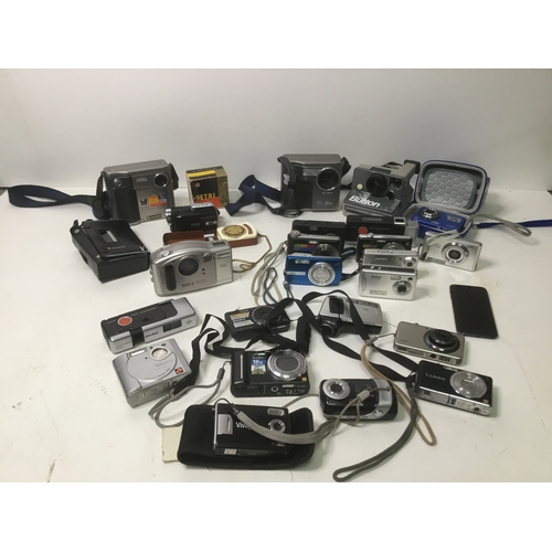 79 - A selection of mainly digital cameras including Kodak, Sony and Olympus