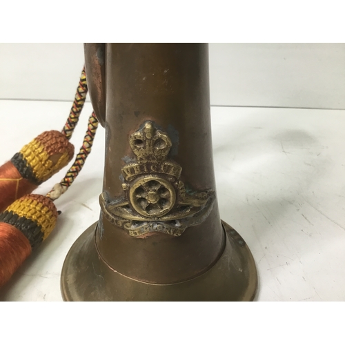 622 - Copper and brass bugle with a Royal artillery badge to the front