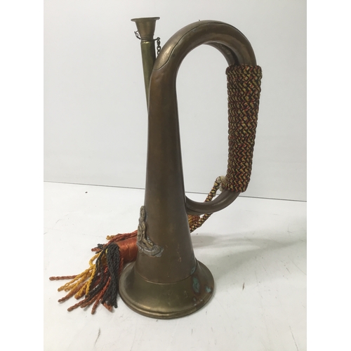 622 - Copper and brass bugle with a Royal artillery badge to the front