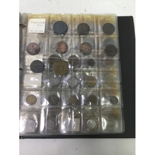 860 - A folder of world coins including UK, Belgium, Italy and others see all pictures