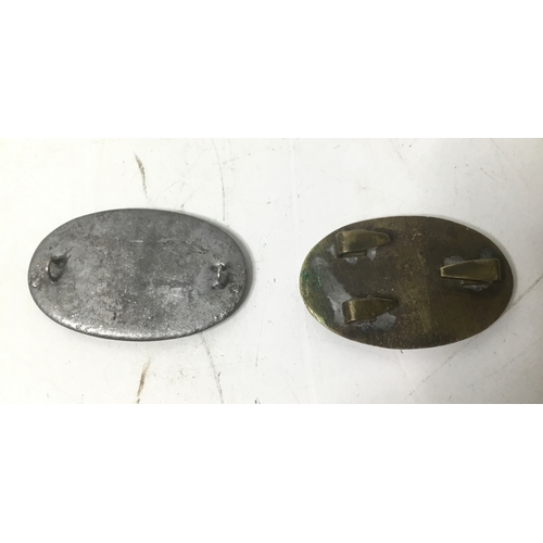 866 - Two oval US army belt buckles