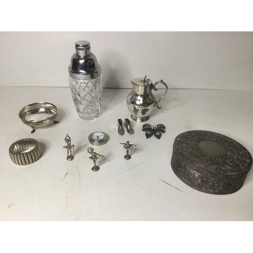 433 - A selection of silver plate items including miniature ballerinas and a cut crystal cocktail shaker.