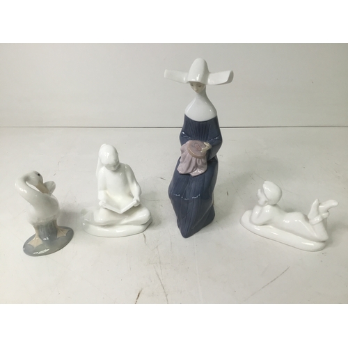 656 - A collection of Lladro and Riyal Doulton figures