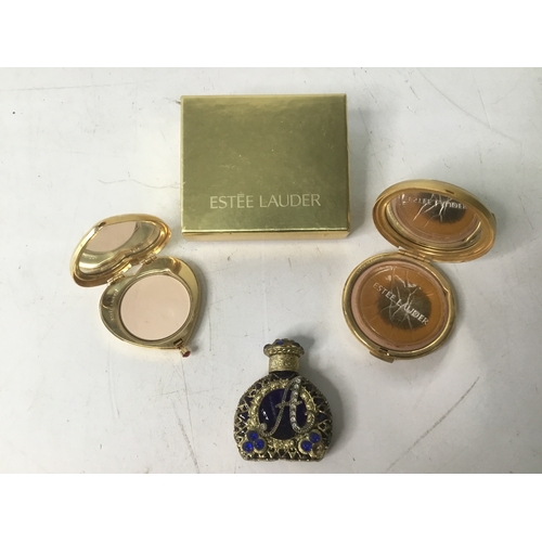 658 - Vintage Czech filigree cobalt blue glass perfume bottle and two Estée Lauder compacts