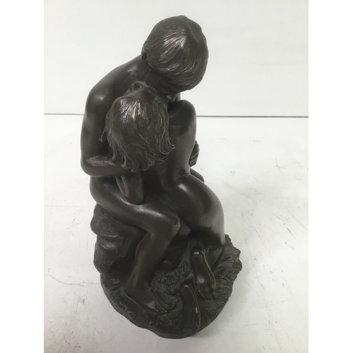 663 - Bronzed resin sculpture of the lovers