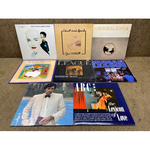 675 - Collection of vinyl LP records including: Eurythmics, Cat Stevens and Joni Mitchell.