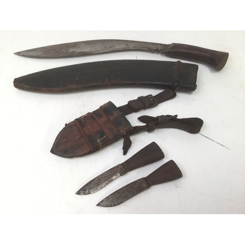 700 - WW2 Indian kukri knife with sheath and accompanying knives