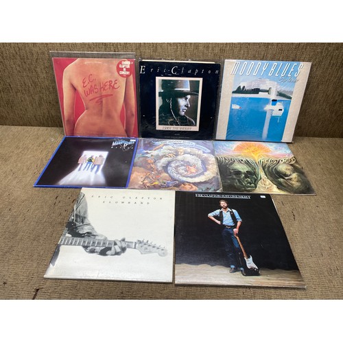 696 - Collection of vinyl LP records including: eric clapton, moody blues.