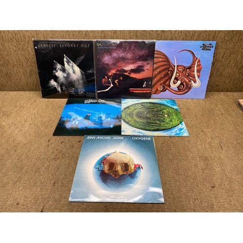 711 - Collection of vinyl LP records including: jean jarre Michael and genesis.