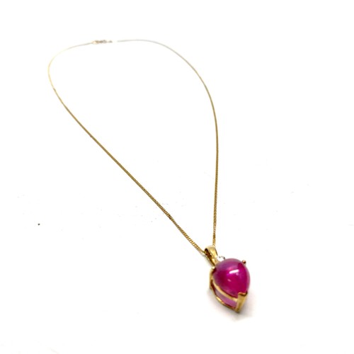 857 - 18ct Gold Chain 1.1g and a 9ct with Gold Pendant of Cabochon Cut Pink Amethyst and Diamond 2.1g.