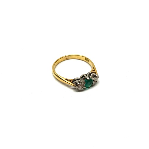 892 - 18ct gold Diamond and emerald ring with a platinum mount. Size M and 2.4g.