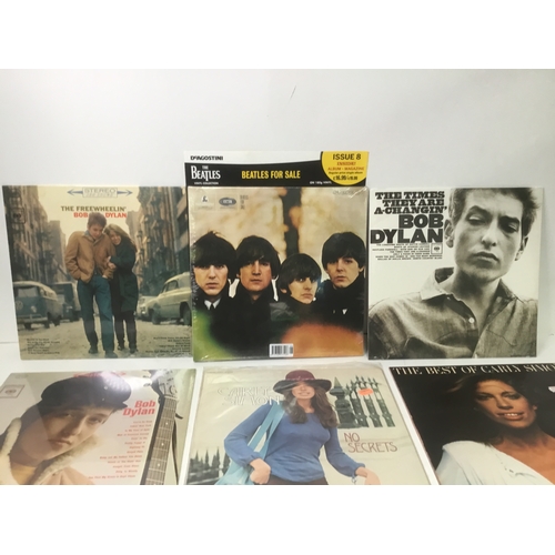 1011A - A selection of vinyl records LP’s including Beatles and Bob Dylan reproduced