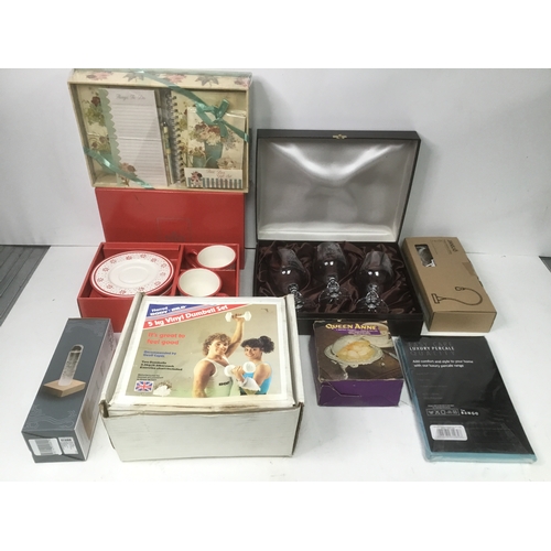 457 - Boxed items including Dumbell set, Racal glasses and a Sia cup and saucer set