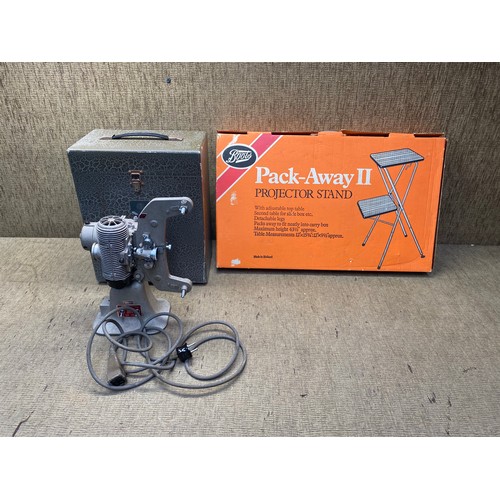 1059 - Packaway projector stand and a vintage bell & howell projector.