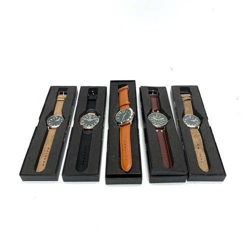 898 - Five Eagle moss boxed watches.