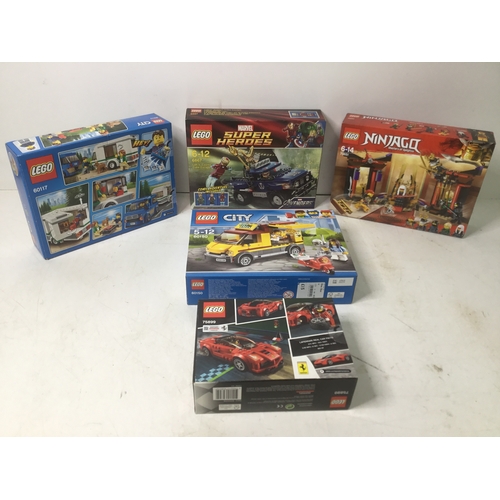 1133 - A collection of boxed Lego Including City and Marvel super heroes