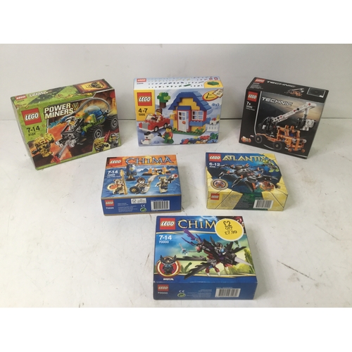 1140 - A collection of boxed Lego Including Power miners and Chima