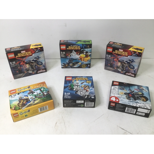 1155 - A collection of boxed Lego Including Super heroes and Castle