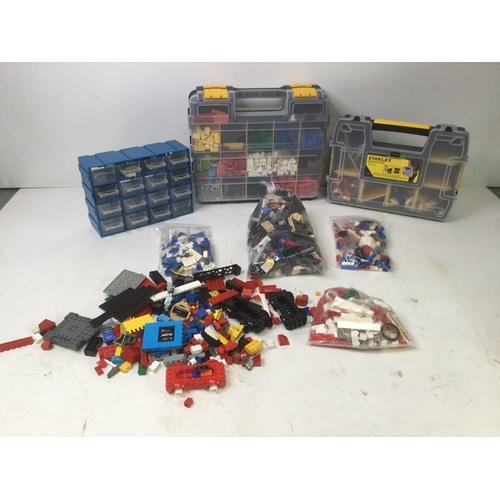 1166 - A quantity of mixed Lego including storage boxes