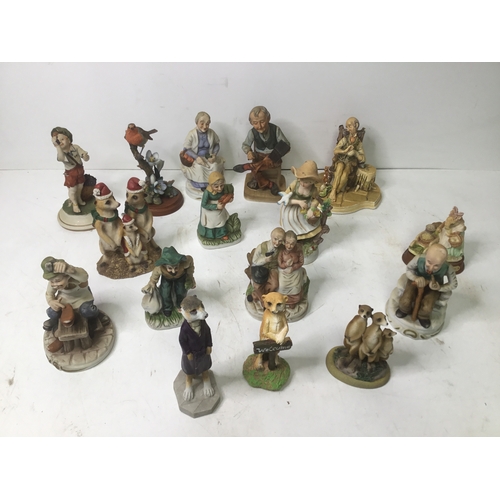 483 - A selection of collectible figures including meerkats