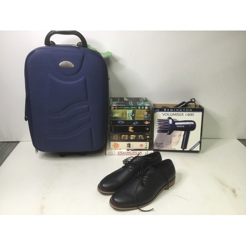 343 - Mixed items including a travel suitcase, DVD box sets and a volumiser 1400 by Remington